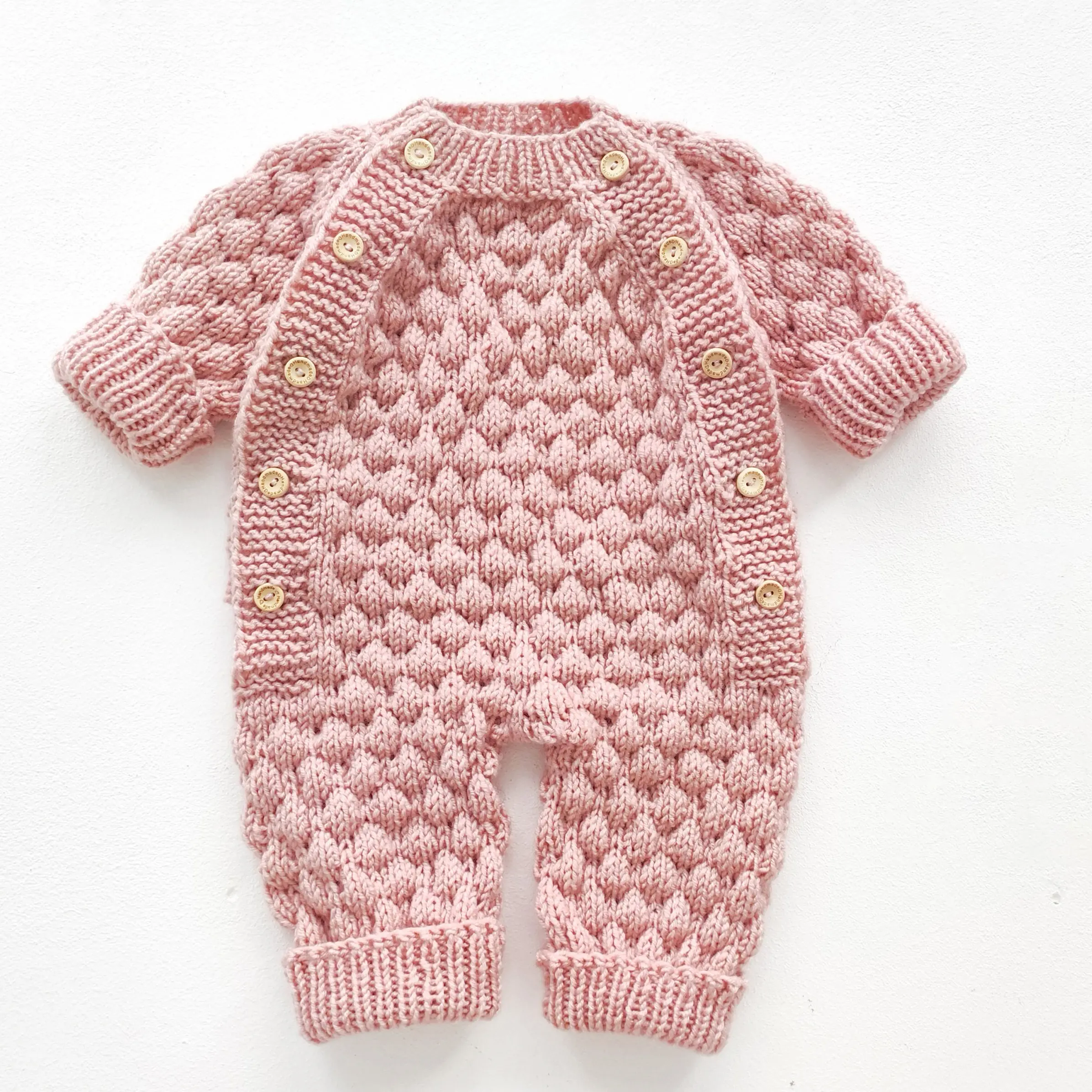 1648535403796467714-10 Knitting pattern baby romper - Image 1